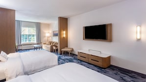 A hotel room with two beds, a TV, a desk, and a chair. - Fairfield Inn & Suites Jasper (Jasper)