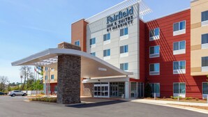 A Fairfield Inn & Suites by Marriott hotel with a modern design, featuring a covered entrance and multiple windows. - Fairfield Inn & Suites by Marriott Augusta Washington Rd./I-20 (Augusta)