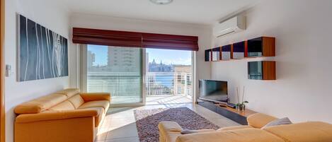 Apartment, 1 Bedroom | Living area | TV