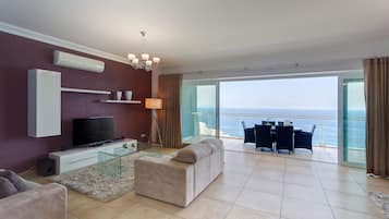 Apartment, 3 Bedrooms | Living area | Smart TV