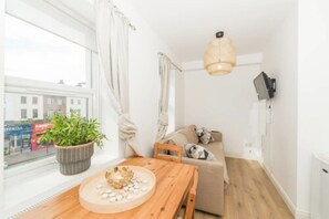 Apartment, 1 Bedroom (Flat 5) | Living area | 20-inch flat-screen TV with cable channels, TV