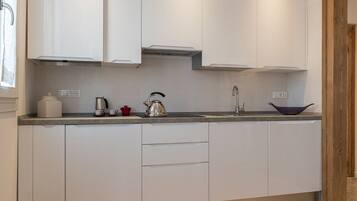 Deluxe Apartment, 1 Bedroom | Private kitchen | Full-sized fridge, microwave, oven, stovetop