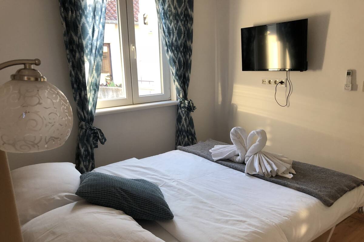 Habitación, vistas a la ciudad | Wifi gratis y ropa de cama