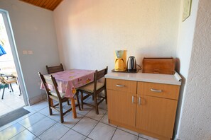 Studio, Balcony | In-room dining