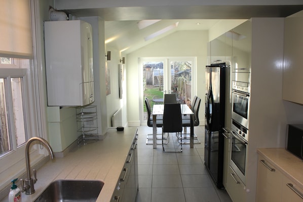 Business Villa, 3 Bedrooms, Garden View | Shared kitchen | Fridge, microwave, coffee/tea maker