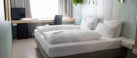 Ropa de cama hipoalergénica y escritorio