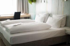Ropa de cama hipoalergénica y escritorio 
