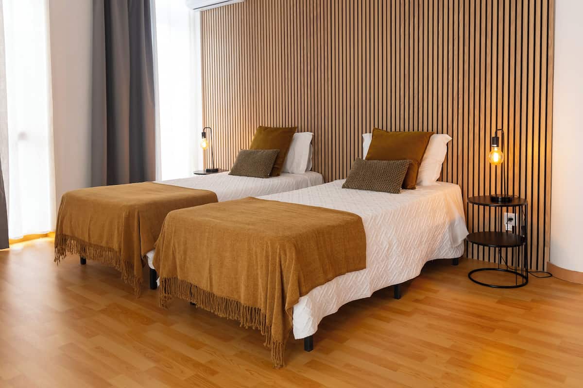 Family Room, Private Bathroom (4) | Blackout curtains, iron/ironing board, free WiFi, bed sheets