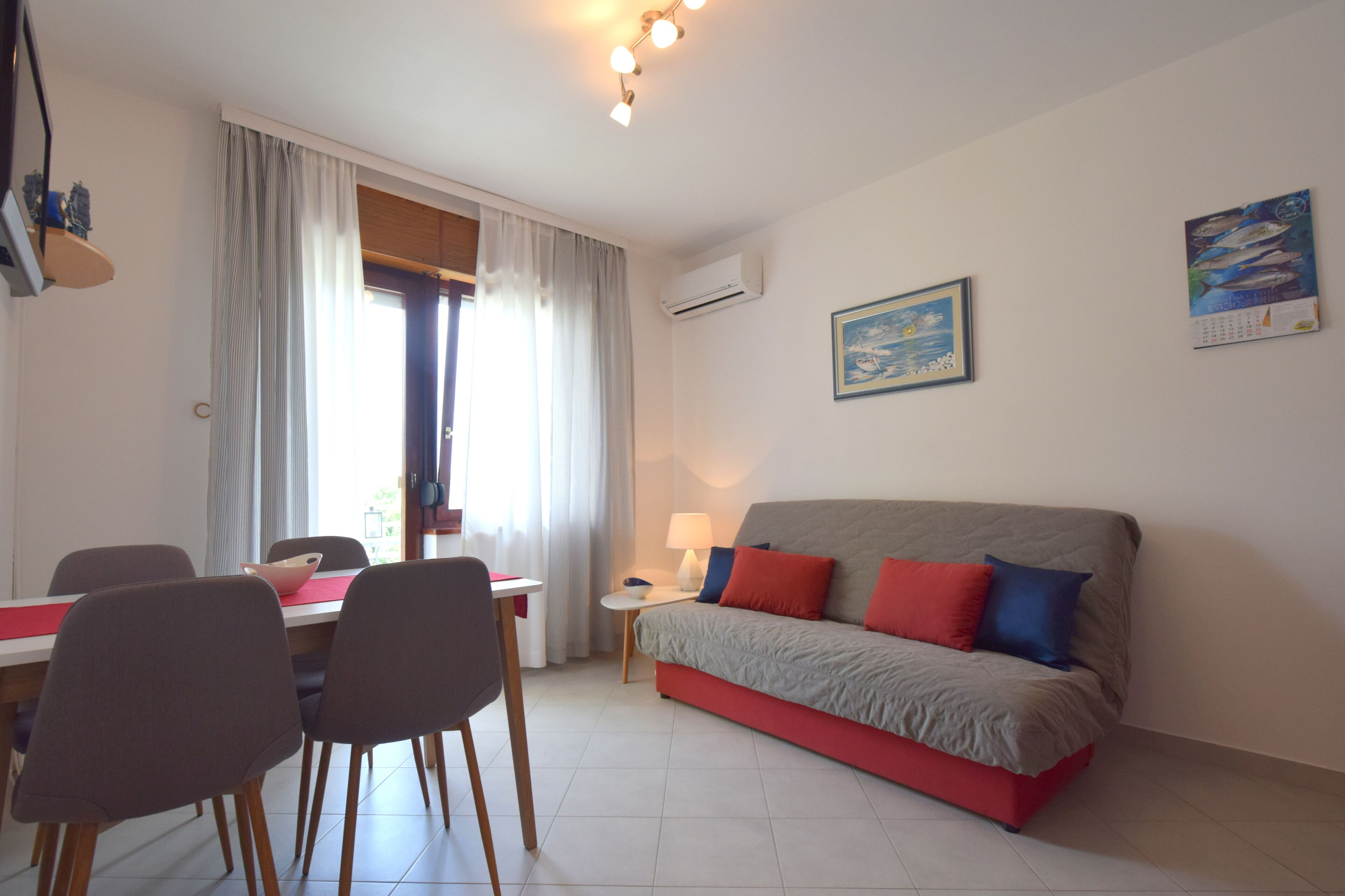 Apartment, 1 Bedroom | Living room | Flat-screen TV
