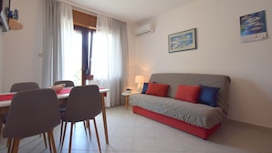 Apartment, 1 Bedroom | Living room | Flat-screen TV - Apartments Olgica (Malinska-Dubasnica)