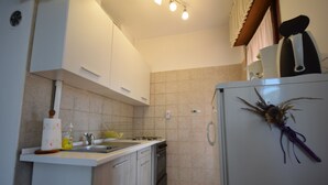 Apartment, 2 Bedrooms | Private kitchen | Coffee/tea maker, full-sized fridge, oven, stovetop - Apartment Terezija (Malinska-Dubasnica)