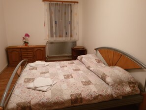 Desk, blackout curtains, free WiFi, bed sheets