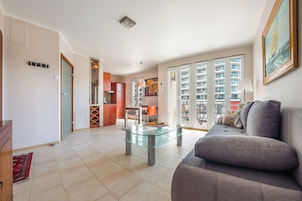 Apartment (522 - ul. Uzdrowiskowa 20) | Living area | Flat-screen TV, DVD player