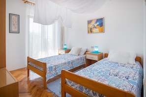 Appartement, 4 chambres | 4 chambres, bureau, Wi-Fi gratuit, draps fournis