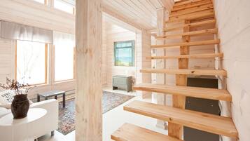 Deluxe-Villa, Sauna | Wohnzimmer | Flachbildfernseher