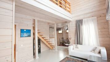 Deluxe-Villa, Sauna | Wohnzimmer | Flachbildfernseher