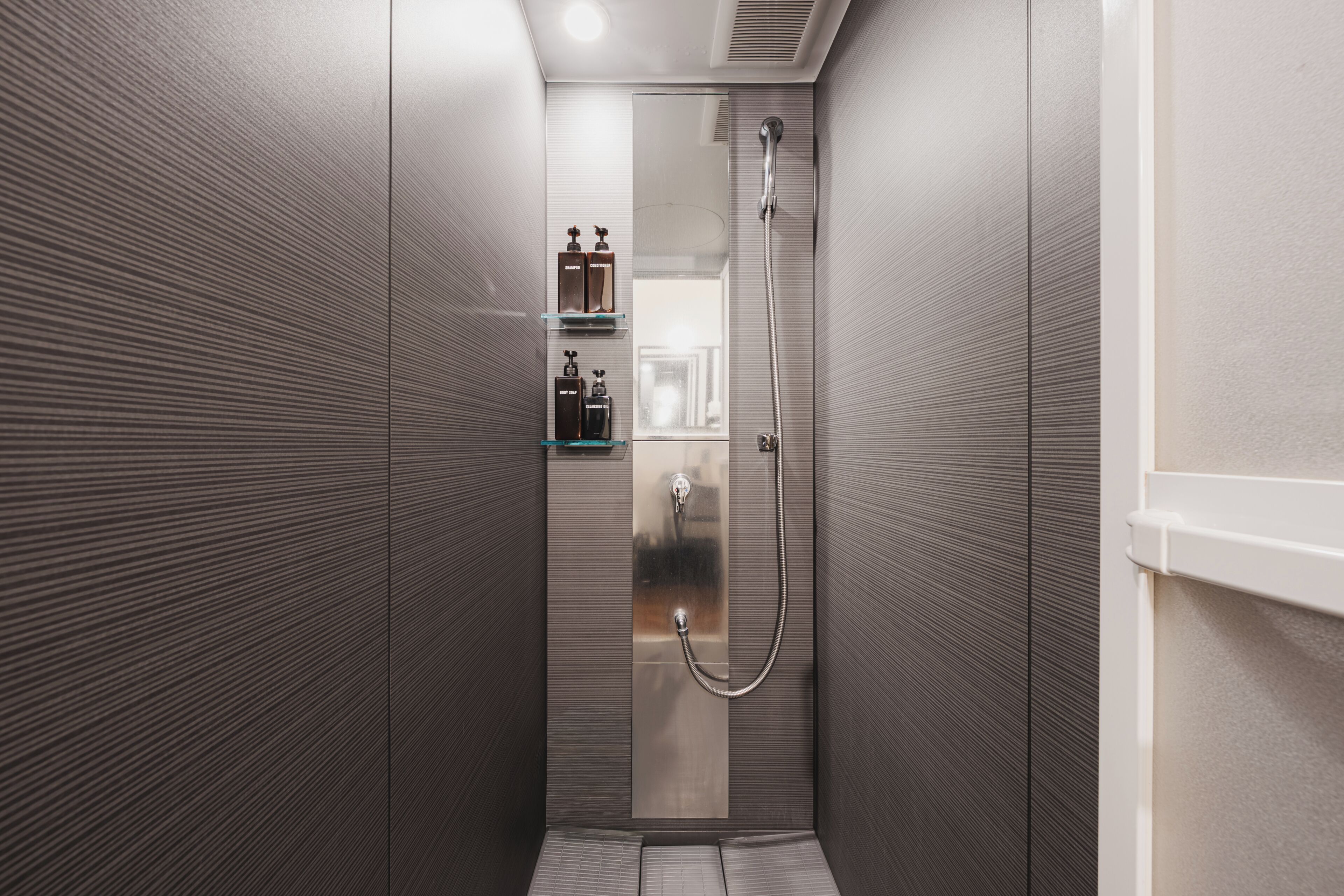 Shower, free toiletries, hair dryer, slippers