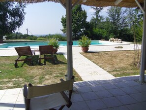 Outdoor pool, pool umbrellas, sun loungers