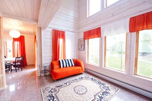 Deluxe Villa, Sauna | Living area | Flat-screen TV