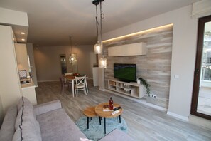 Luxury Apartment, Balcony, City View | Living area | Smart TV, Netflix, computer, pay movies - Apartments Angelov (Varna)