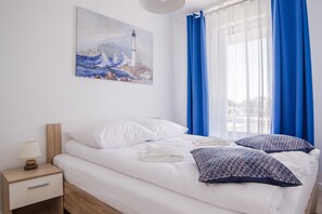 Apartment (9 ul. Rybacka 11 F) | Individually decorated, individually furnished, iron/ironing board - Apartamenty Sun&Snow Osiedle Bursztynowe (Kolobrzeg)
