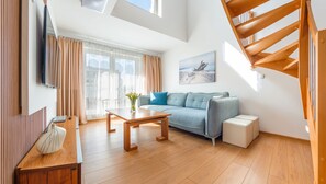 Appartamento (414) | Area soggiorno | TV a schermo piatto