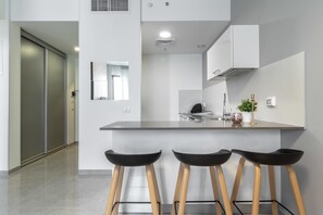 엘리 트 아파트, 퀸사이즈침대 1개 | 객실 내 식사 공간