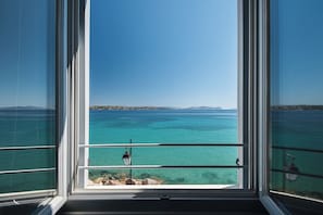 Suite, Sea View | In-room safe, desk, blackout drapes, soundproofing