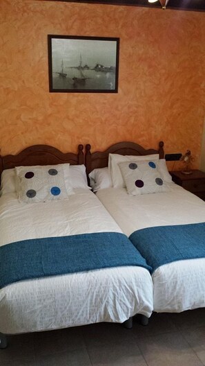 Blackout drapes, iron/ironing board, rollaway beds, free WiFi