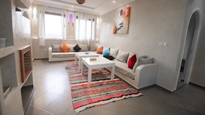 Luxury Apartment, 2 Bedrooms (1st Floor) | Living area | Flat-screen TV - Agadir Well (Mirleft)