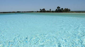 Outdoor pool, pool umbrellas, pool loungers