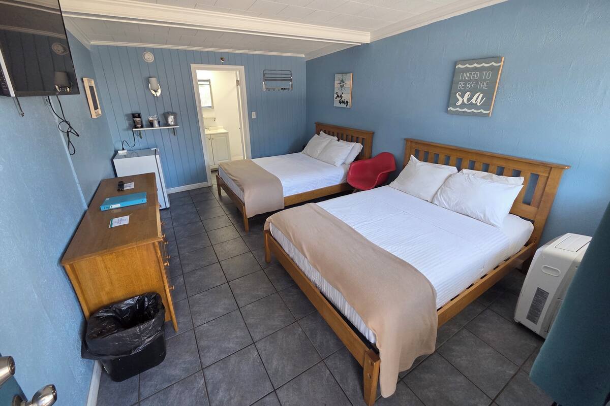 Deluxe Double Room Single Use, 2 Double Beds, Non Smoking | 1 bedroom, individually decorated, individually furnished