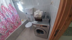 Hair dryer, towels, soap, shampoo