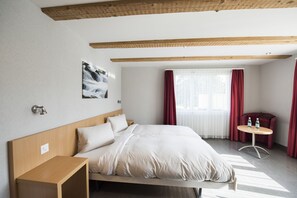 Habitación individual | Escritorio, cortinas blackout, wifi gratis y ropa de cama 