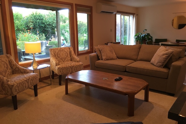 Living room: pull out sofa bed, books, dvds, games, tv, gas fireplace, and a/c.