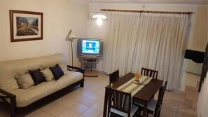 Standard Duplex, 2 Bedrooms, Kitchen | Living area | TV - Duplex El Nilo by Abt (Villa Carlos Paz)