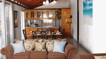 Standard Apartment, 3 Bedrooms, 2 Bathrooms | Living area | Flat-screen TV