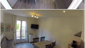 A compact kitchen with modern appliances, a dining area with a table and chairs, and a living area with a sofa. - Apartment in villa, sea view from bedrooms (Hyères)