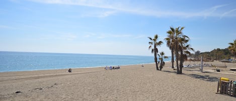 On the beach, beach towels