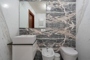 Shower, hair dryer, bidet, heated floors