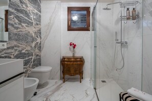 Shower, hair dryer, bidet, heated floors