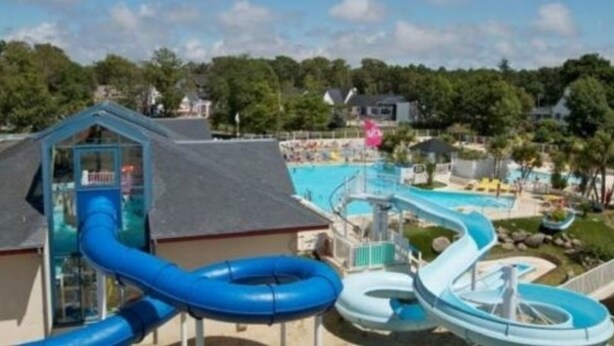 A water park with multiple slides and a pool area. - 3 Bedroom mobile home Brittany 580 (Pont-Aven)