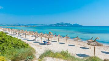 Una spiaggia nelle vicinanze, teli da spiaggia