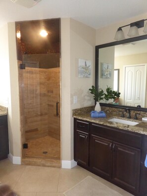 Combined shower/tub, hair dryer, towels, soap