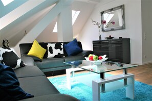 Flat-screen TV, books, offices
