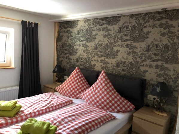 4 bedrooms, iron/ironing board, travel cot, WiFi