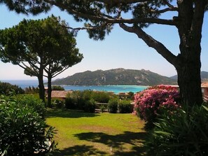 Escape to a serene oasis with lush gardens, mature trees, and breathtaking coastal views.