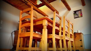 A room with exposed wooden beams and a wooden chair structure. - House Limeray, House Kayserberg Vineyard 10 people (Kaysersberg Vignoble)
