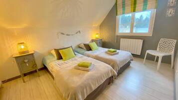 2 slaapkamers, een strijkplank/strijkijzer, gratis wifi, beddengoed