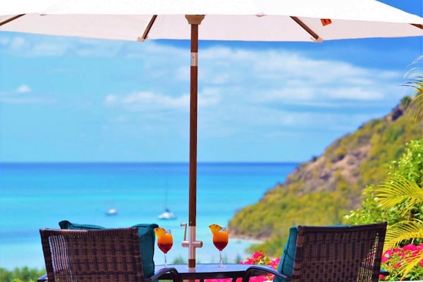 A perfect spot for two overlooking the Caribbean Sea.